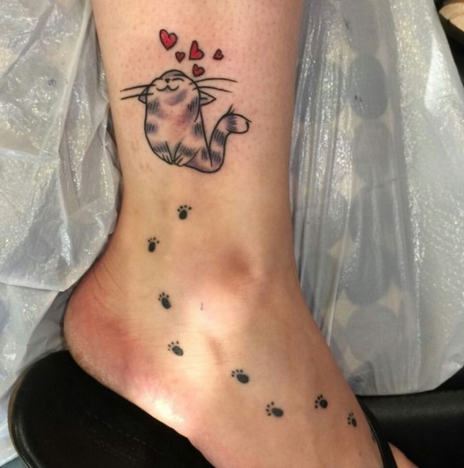 Is it possible to cover up just the body of this cat tattoo  rtattooadvice